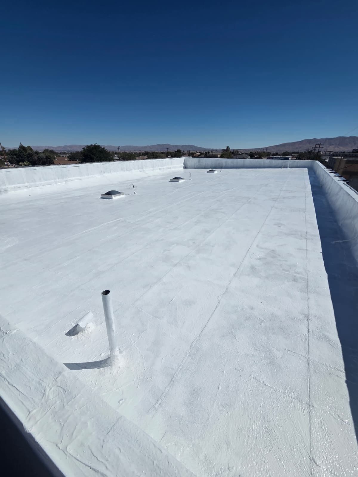 Commercial Roof Protection with Lucas 8,000 Silicone Coating